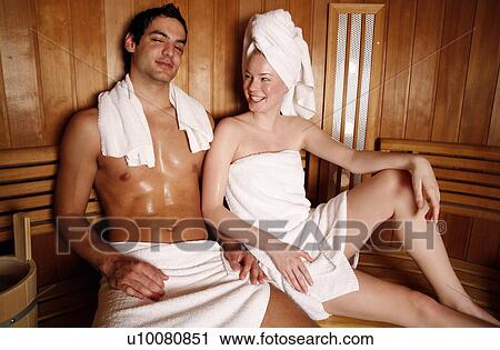 A couple enjoying a sauna together View Large Photo Image Stock Image - A couple enjoying a sauna together. Fotosearch