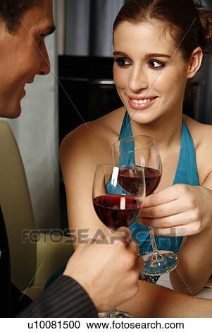 Couple having a romantic dinner in a restaurant View Large Photo Image Stock Image - Couple having a romantic dinner in a restaurant. Fotosearch