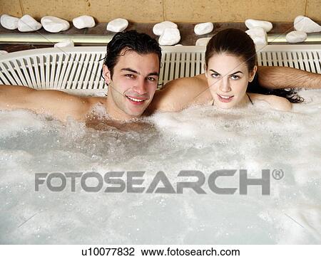 One man with one woman in jacuzzi at a spa View Large Photo Image Stock Image - One man with one woman in jacuzzi at a spa. Fotosearch