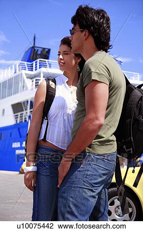Young couple at ferry dock View Large Photo Image Stock Image - Young couple at ferry dock. Fotosearch