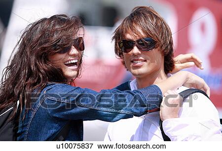 Stock Photo - Young couple in front of ferry. Fotosearch
