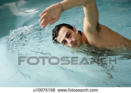 Man exercising in a spa pool View Large Photo Image Stock Photo - Man exercising in a spa pool. Fotosearch