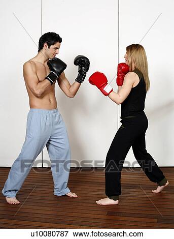 Straight right-hand punch of Active Tae Bo and inside block View Large Photo Image Stock Photo - Straight right-hand punch of Active Tae Bo and inside block. Fotosearch