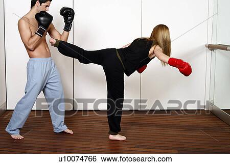 Straight right-hand punch of Active Tae Bo and side kick View Large Photo Image Stock Photograph - Straight right-hand punch of Active Tae Bo and side kick. Fotosearch
