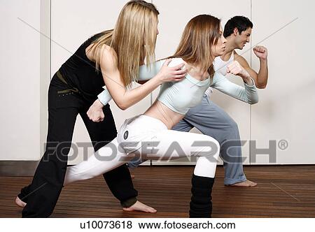 Students learning a basic Capoeira move View Large Photo Image Stock Photo - Students learning a basic Capoeira move. Fotosearch
