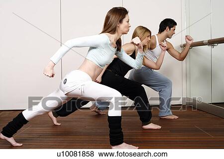 Students learning a basic Capoeira move View Large Photo Image Stock Photo - Students learning a basic Capoeira move. Fotosearch