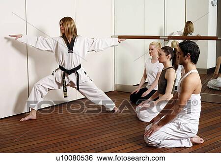 Students observing Tae Kwon Do - Dantae demonstration View Large Photo Image Stock Photograph - Students observing Tae Kwon Do - Dantae demonstration. Fotosearch