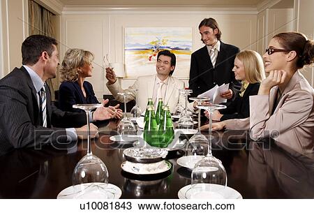 Business people having a meeting View Large Photo Image Stock Image - Business people having a meeting . Fotosearch
