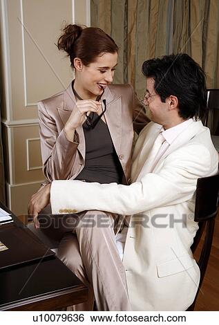 Stock Photograph - Business people having a meeting . Fotosearch