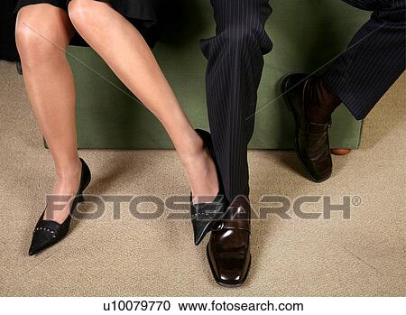 Man and Woman playing footsie View Large Photo Image Stock Image - Man and Woman playing footsie. Fotosearch