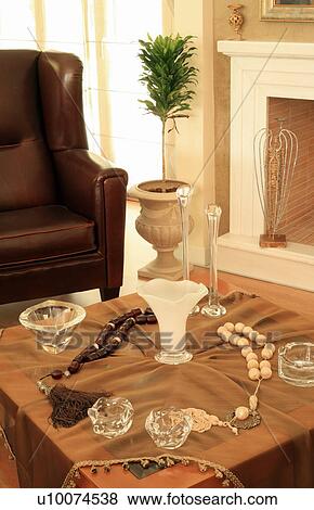 Objet d'art on coffee table in living room View Large Photo Image Stock Photo - Objet d'art on coffee table in living room. Fotosearch