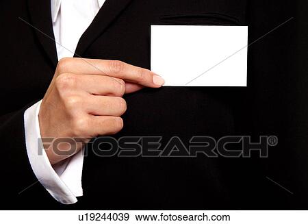A woman holding a nametag View Large Photo Image Stock Photo - A woman holding a nametag . Fotosearch