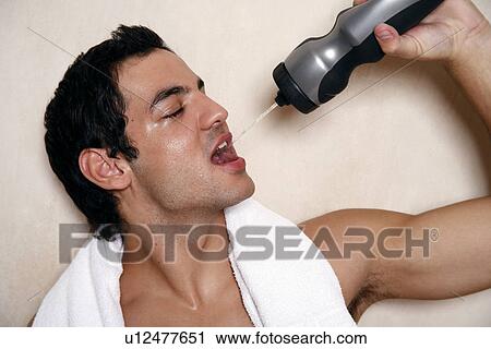 Man cooling off after the gym View Large Photo Image Stock Image - Man cooling off after the gym. Fotosearch