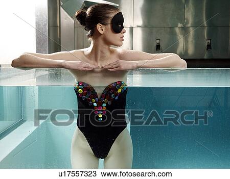 Stock Image - Woman portrait in spa swimming pool. Fotosearch