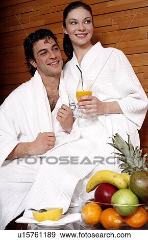 A couple having a refreshment after a spa treatment View Large Photo Image Stock Photo - A couple having a refreshment after a spa treatment. Fotosearch