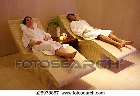 Stock Photo - A couple relaxing at a spa together. Fotosearch