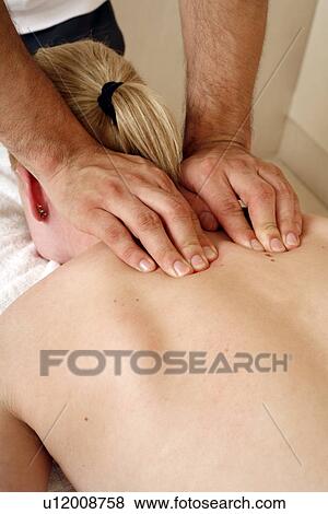 Back massage View Large Photo Image Stock Photo - Back massage. Fotosearch