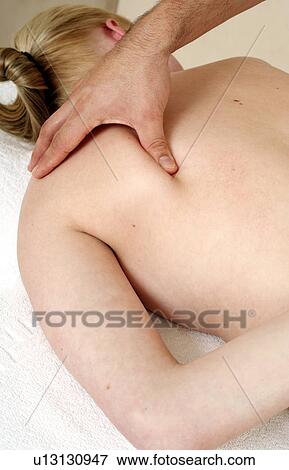 Stock Photo - Back massage. Fotosearch