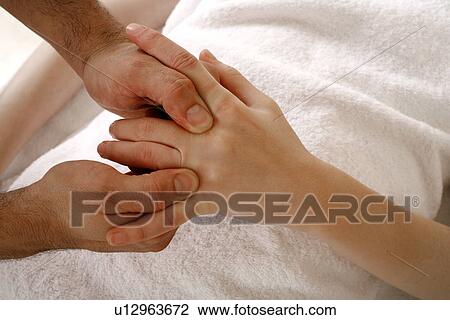 Stock Image - Hand massage. Fotosearch