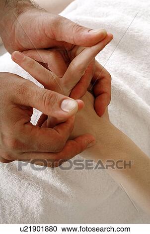 Stock Image - Hand massage. Fotosearch
