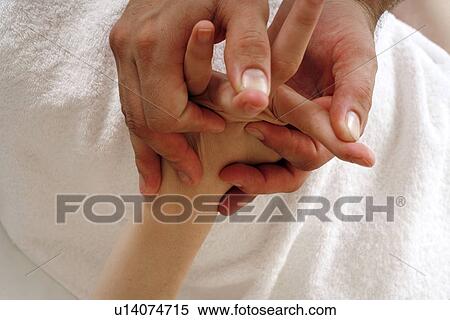 Stock Photography - Hand massage. Fotosearch