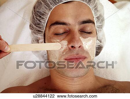 Man having a facial treatment in a spa View Large Photo Image Stock Image - Man having a facial treatment in a spa. Fotosearch