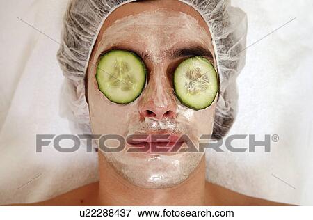 Man having a facial treatment in a spa View Large Photo Image Stock Photo - Man having a facial treatment in a spa. Fotosearch