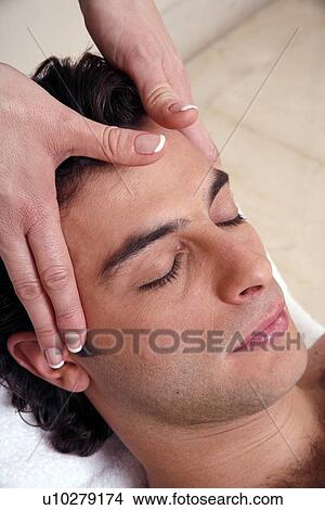 Man having facial massage View Large Photo Image Picture - Man having facial massage. Fotosearch