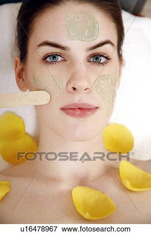 Woman having a facial treatment in a spa View Large Photo Image Stock Photo - Woman having a facial treatment in a spa. Fotosearch
