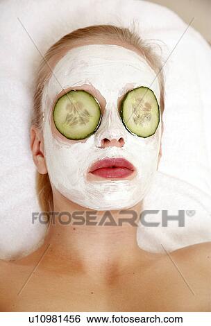 Woman having a facial treatment in a spa View Large Photo Image Stock Photograph - Woman having a facial treatment in a spa. Fotosearch