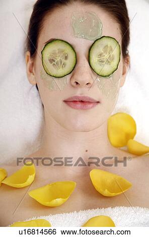 Woman having a facial treatment in a spa View Large Photo Image Stock Photograph - Woman having a facial treatment in a spa. Fotosearch