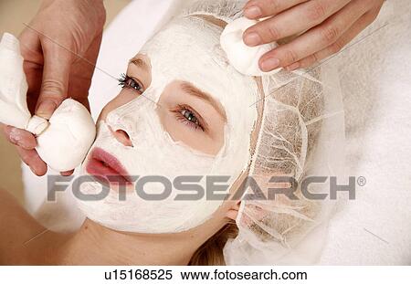 Woman having a facial treatment in a spa View Large Photo Image Stock Photography - Woman having a facial treatment in a spa. Fotosearch