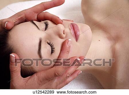 Woman having facial massage View Large Photo Image Stock Photo - Woman having facial massage. Fotosearch