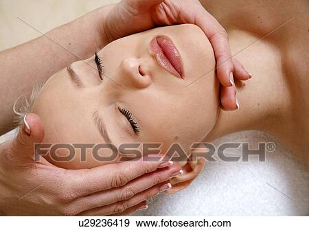 Woman having facial massage View Large Photo Image Stock Photo - Woman having facial massage. Fotosearch