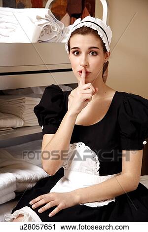 Hotel maid taking a break View Large Photo Image Stock Image - Hotel maid taking a break. Fotosearch