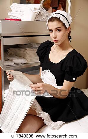 Hotel maid taking a break View Large Photo Image Stock Photo - Hotel maid taking a break. Fotosearch