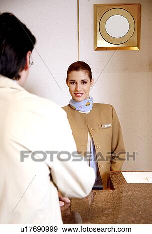 Hotel Receptionist View Large Photo Image Stock Photo - Hotel Receptionist. Fotosearch