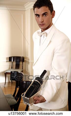 Hotel waiter View Large Photo Image Stock Image - Hotel waiter . Fotosearch