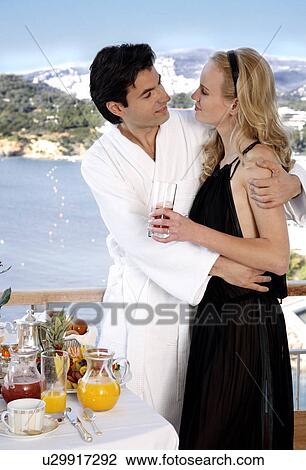 Couple having breakfast on hotel terrace View Large Photo Image Stock Image - Couple having breakfast on hotel terrace. Fotosearch