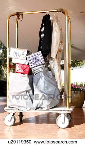 Luggage cart at hotel entrance View Large Photo Image Stock Image - Luggage cart at hotel entrance. Fotosearch