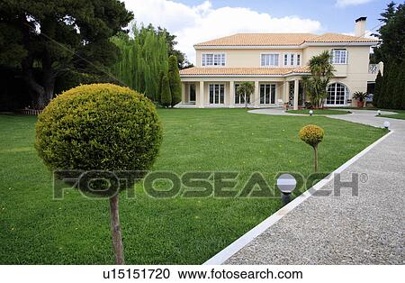 Exterior view of modern house View Large Photo Image Stock Image - Exterior view of modern house. Fotosearch