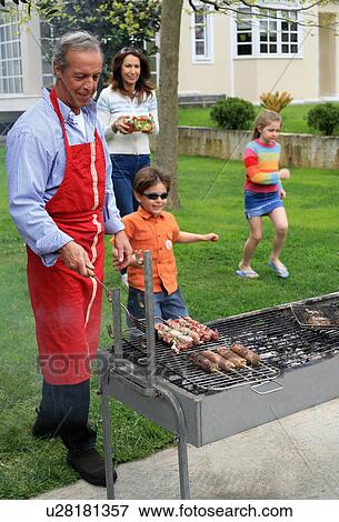 Family barbecue View Large Photo Image Stock Photo - Family barbecue. Fotosearch