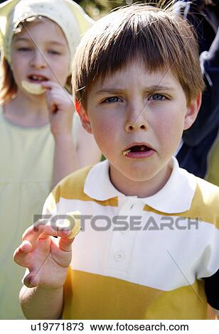 Children eating potato chips View Large Photo Image Stock Image - Children eating potato chips. Fotosearch
