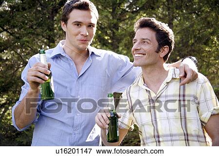 Stock Photo - Two men drinking beer. Fotosearch
