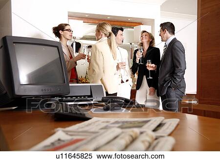 Stock Photography - Bussiness people having a meeting. Fotosearch