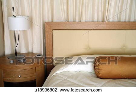 Bed and sidetable View Large Photo Image Stock Image - Bed and sidetable. Fotosearch