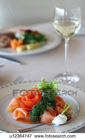 Smoked salmon dish on dinner table View Large Photo Image Stock Photo - Smoked salmon dish on dinner table. Fotosearch