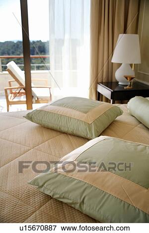 View from hotel room bed View Large Photo Image Stock Photo - View from hotel room bed. Fotosearch