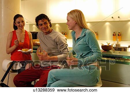 Pilates students at fitness club juice bar View Large Photo Image Stock Photo - Pilates students at fitness club juice bar. Fotosearch