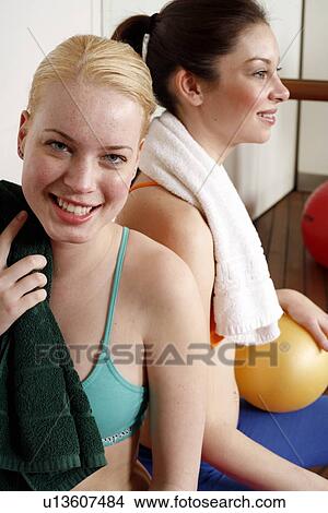 Picture - Two young women after a workout. Fotosearch